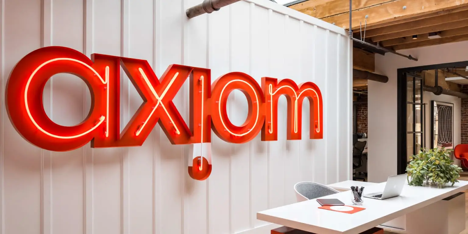 Axiom logo in red on the wall 