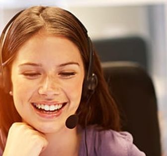 A woman with a headset on. 