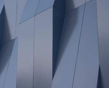 The image shows an abstract architectural structure with sharp, angular shapes and lines in shades of blue and grey, creating a visually striking and geometric design