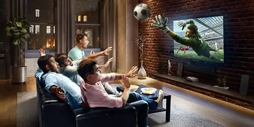 A soccer player jumping out of the TV into a living room