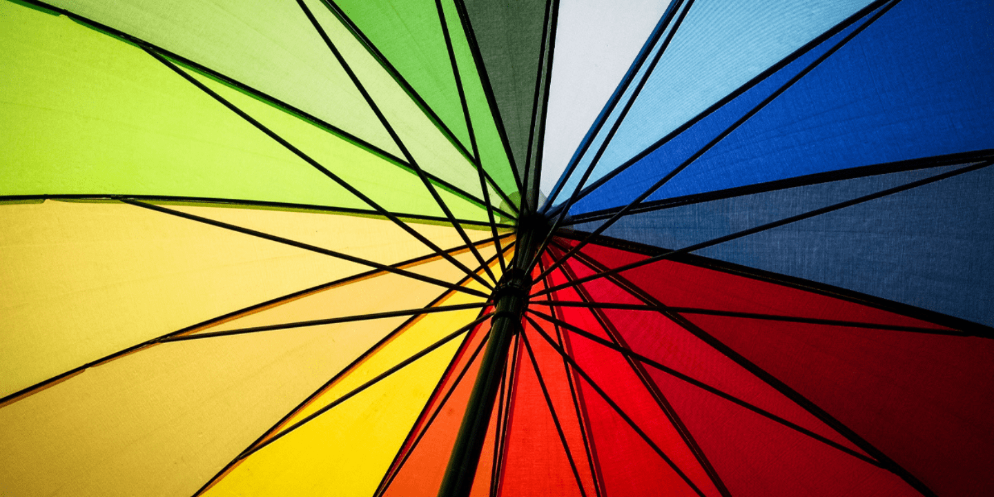 An inside view of a rainbow umbrella 