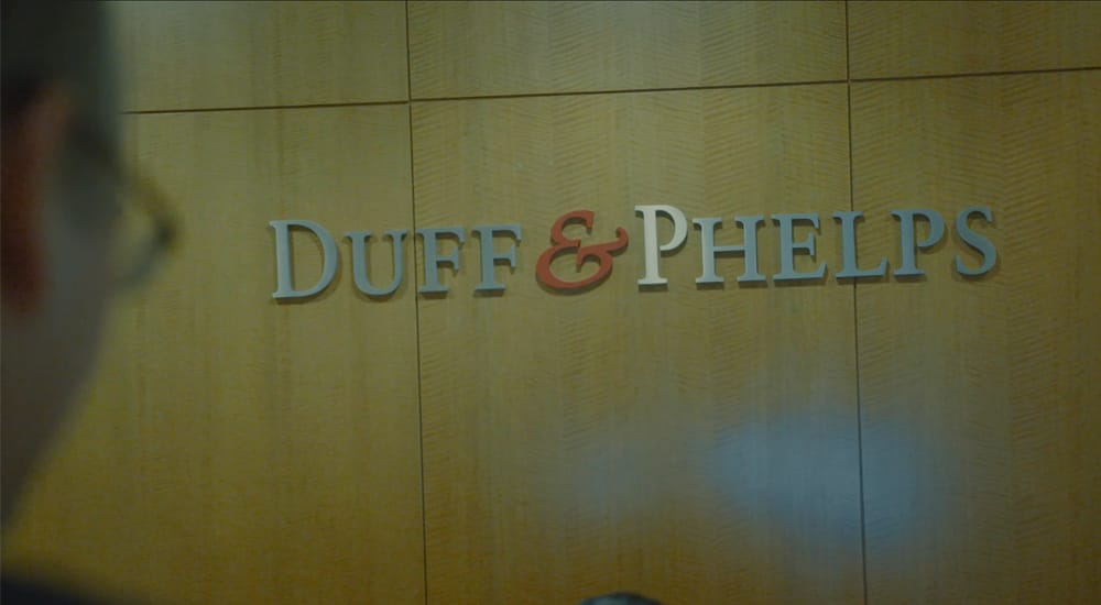 Duff and Phelps logo on the wall. 