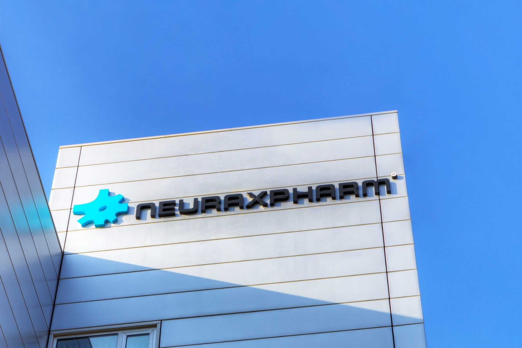 Neuraxpharm logo on a building