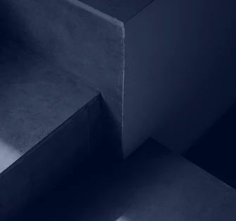 The image depicts a dark, abstract architectural design with sharp angles and contrasting shadows, creating a moody and dynamic visual effect