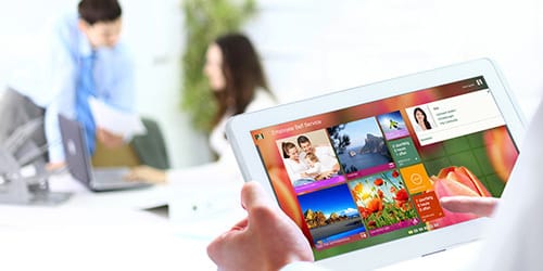 A person looking at a tablet